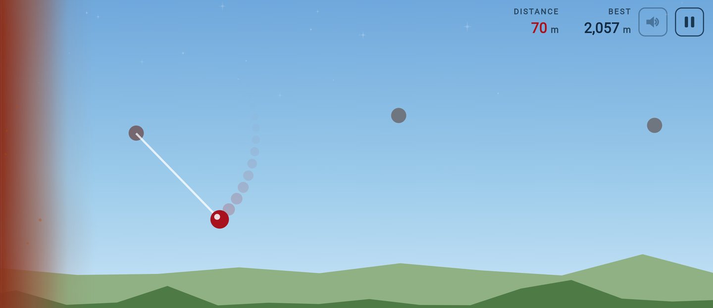 The same swing in the daylight look, over green hills